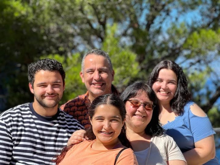 The Sarmiento family together outdoors